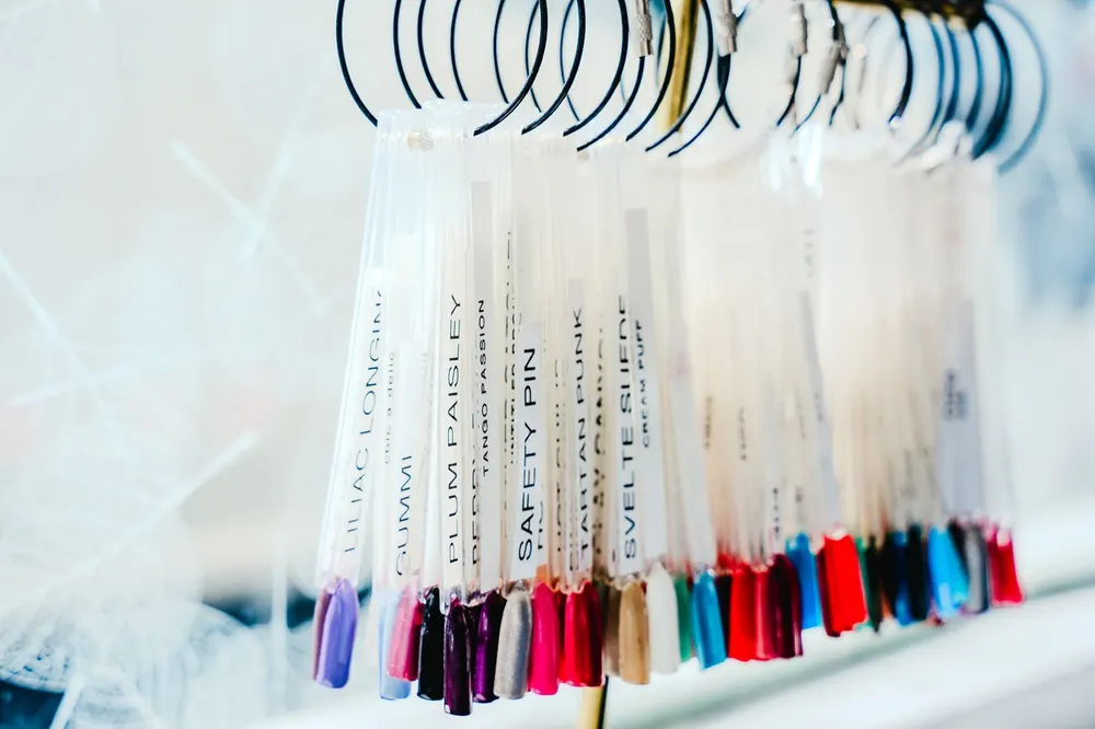 Trays of individual lash extensions in a range of lengths and curls