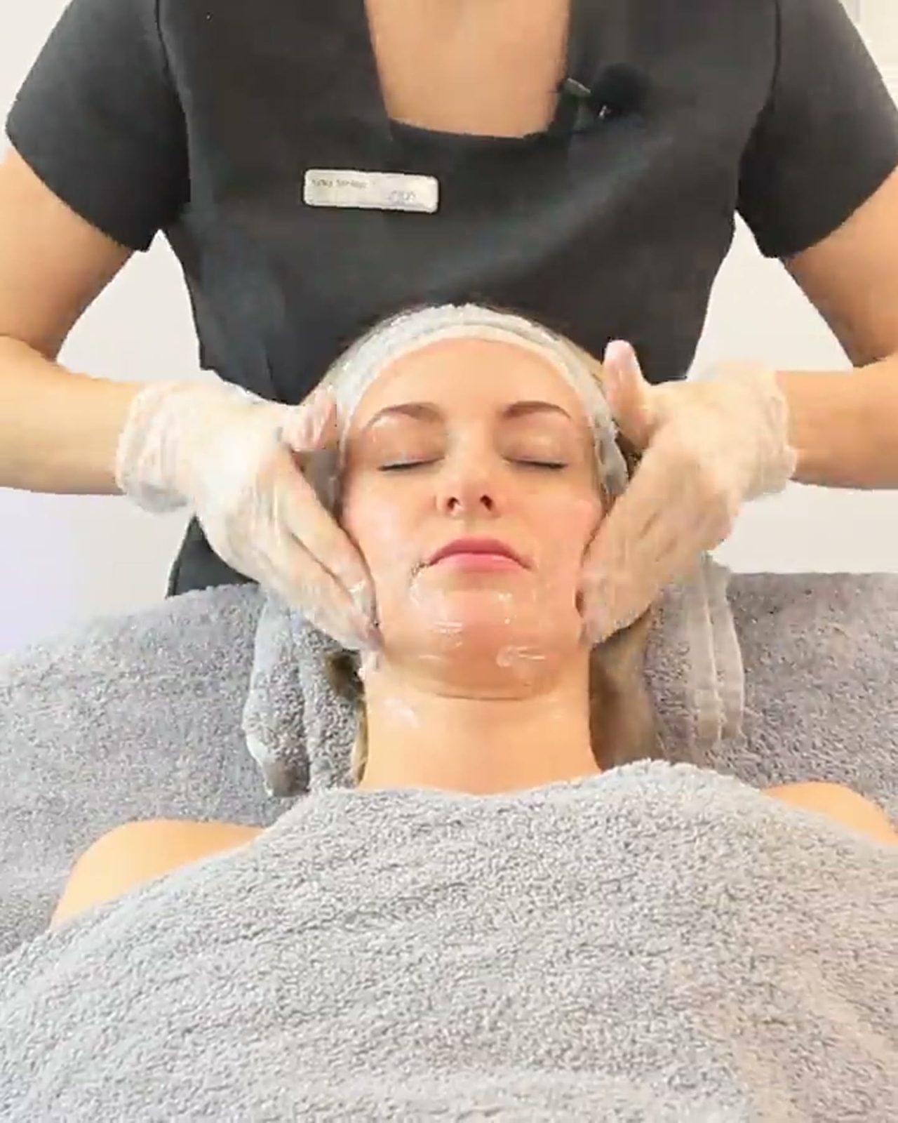 Christmas facial in Bristol at Skin & Beauty Box: a therapist giving a facial