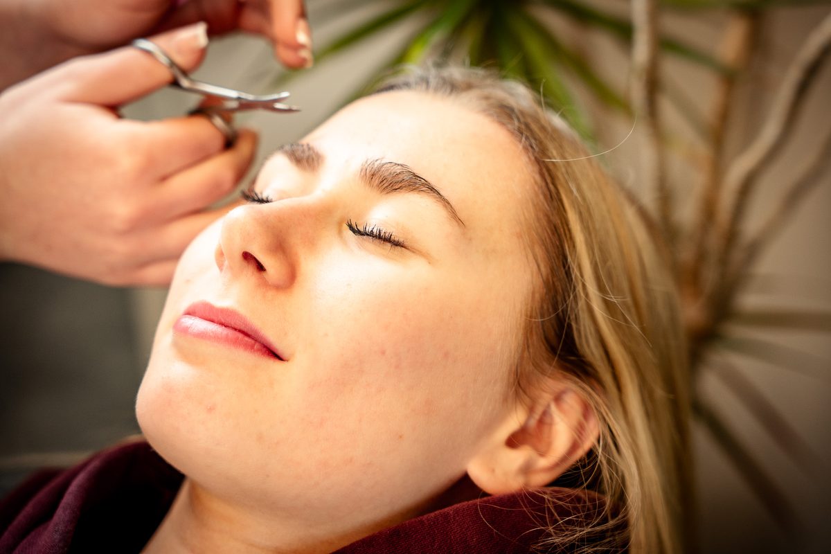 Lash extensions being applied